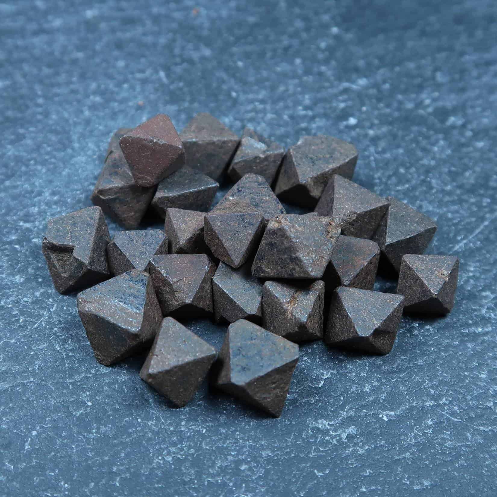 A mixture of  octahedral Magnetite crystals.