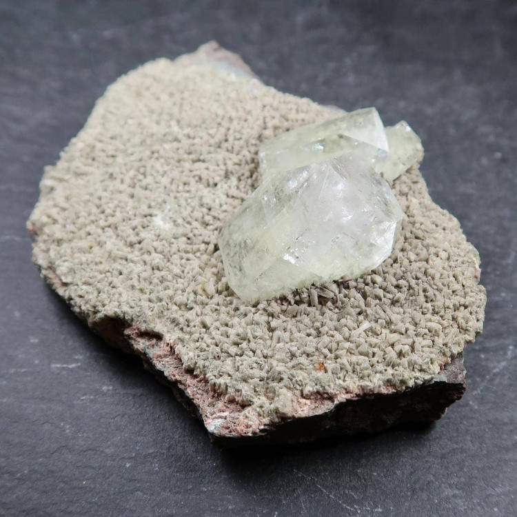 Green Fluorite crystal specimens on matrix
