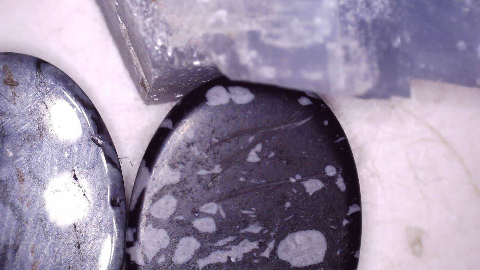 Scratched by Calcite, showing a Mohs hardness of less than 3.